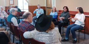 An author presentation at Folsom Library March, 2024, where author Joan M. Griffin (on the left) talks about "Force of Nature."